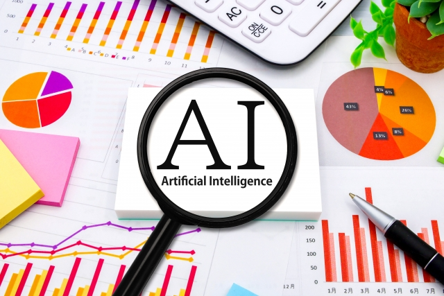 AIの文字を虫眼鏡で拡大している