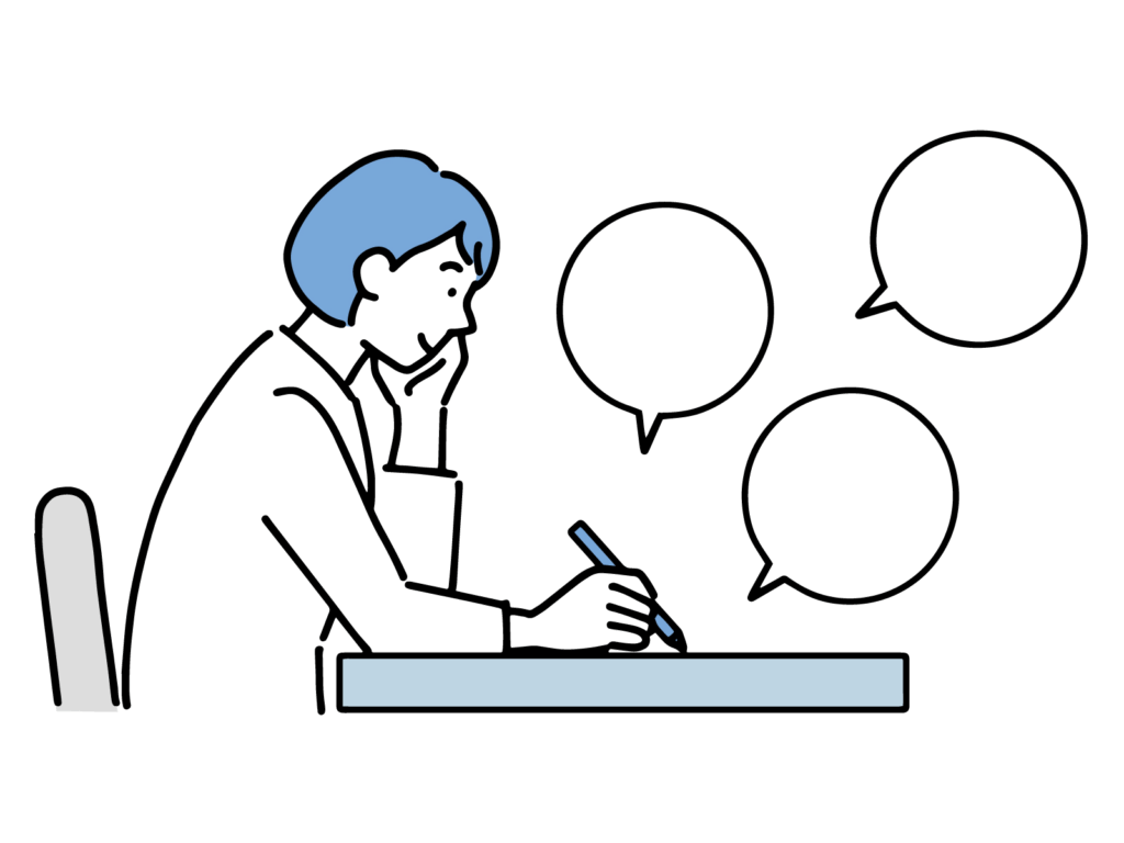 デスクでメモを取っている女性