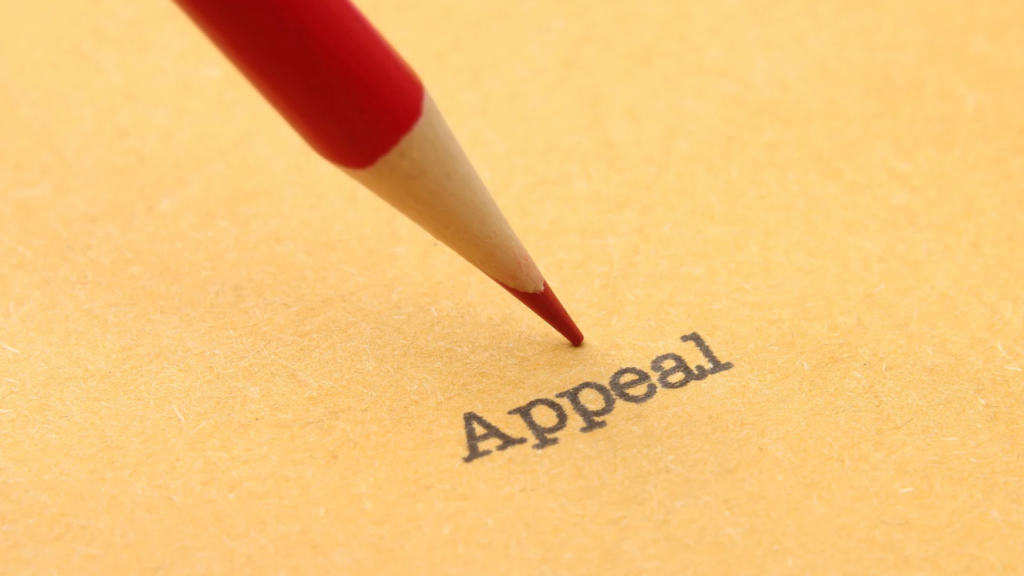 Appealの文字の上に赤鉛筆がある